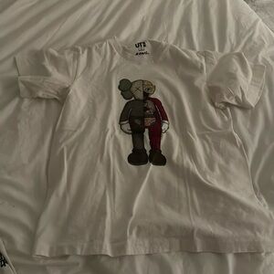 White Uniqlo x kaws tshirt